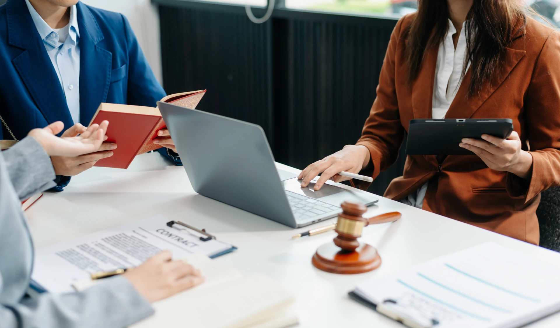 business-people-and-lawyers-discussing-contract
